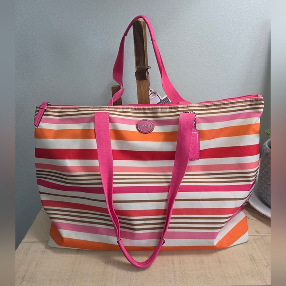 Coach Handbags - Coach Getaway Signature Weekender Tote in a multi-colored stripe pattern, EUC